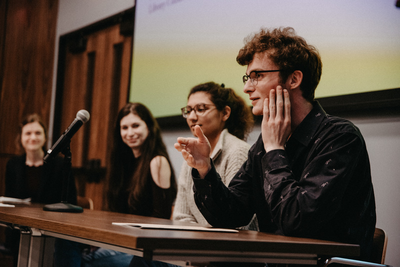 Student panelists, Rachel Schiffer, Natasha Bansal, and Aidan Chapin, speaking at the exhibition opening.